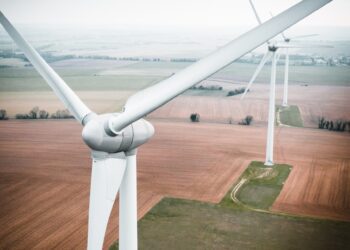 three white windmill during daytime
