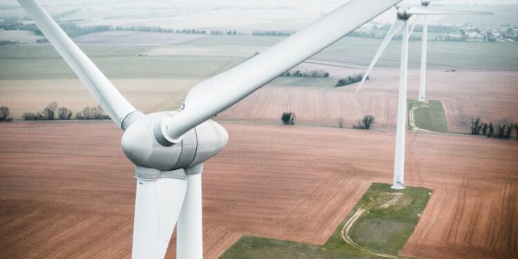 three white windmill during daytime