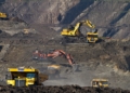 photography of excavators at mining area