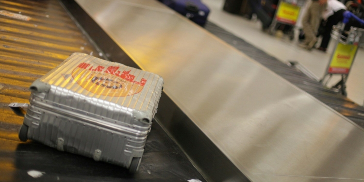gray hardside luggage