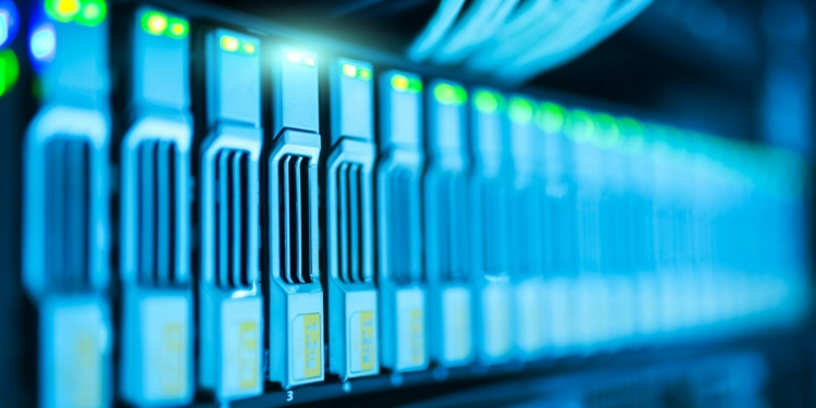 Detailed image of a server rack with glowing lights in a modern data center.