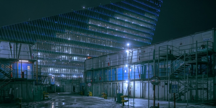 gray and white building during night time