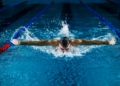 man doing butterfly stroke
