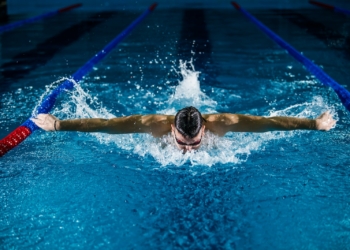 man doing butterfly stroke