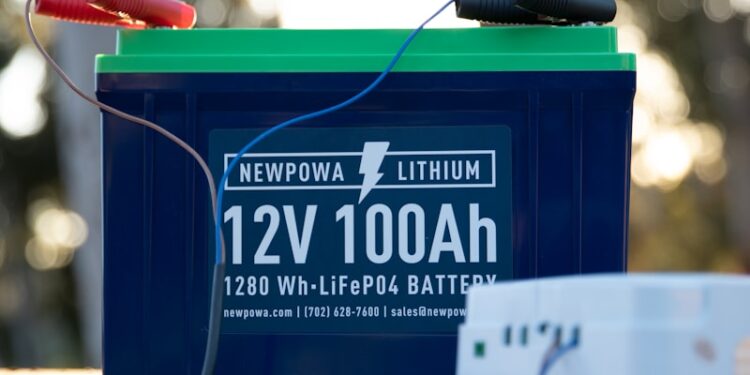 a battery and a charger sitting on a bench