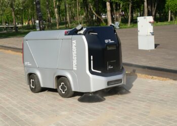 an electric vehicle parked on the side of the road