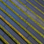 Google carbon-free energy - wind turbines solar panels field