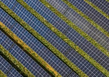 Google carbon-free energy - wind turbines solar panels field