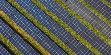 Google carbon-free energy - wind turbines solar panels field