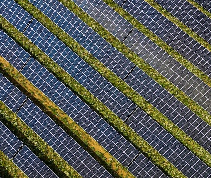 Google carbon-free energy - wind turbines solar panels field